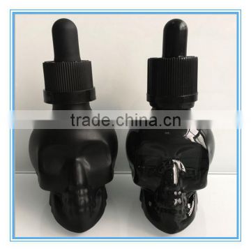 cheap empty glass cosmetic skull dropper bottle with tamper dropper cap