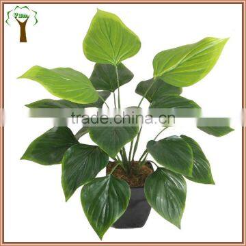 artificial green plant in gem shape bush