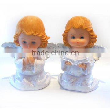 polyresin angel,praying angel with a book,praying angel put one's palms together devoutly