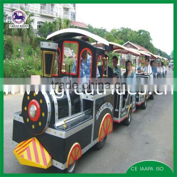 Large amusement park rides tourist diesel trackless train