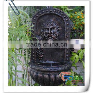 Garden old man human face wall water fountain