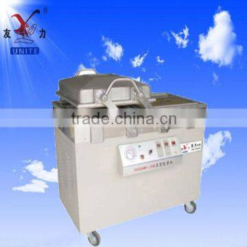 Double chamber vacuum packaging machine