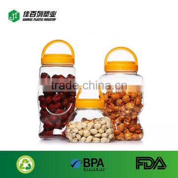 Wholesale price food container 750ml plastic bottle for food hot sale handle candy plastic jar