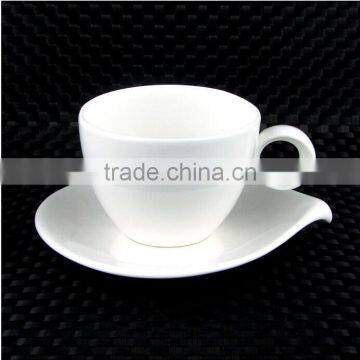 white porcelain cappuccino coffee cup and saucer