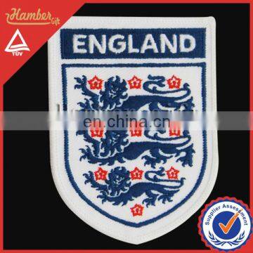 England shield-shaped designer jeans patch