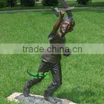 Bronze kid playing plane outdoor statue