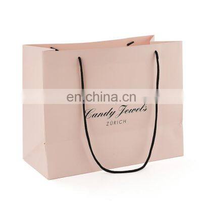 Luxury Custom Logo Gold Foil Printed White Cloth Paper Packaging Bag With Handle photo-4