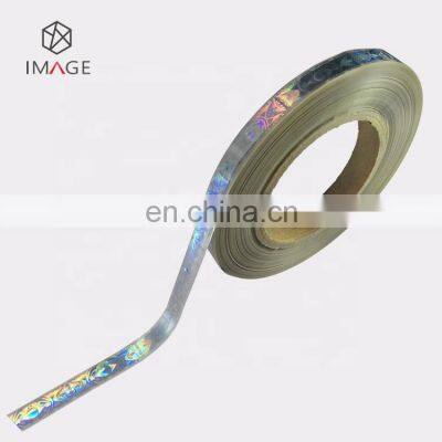 Катушка серебряной деметализированной голографической фольги в полоску для печатных бумажных этикеток photo-2