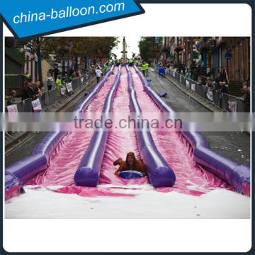 300m purple color three lanes inflatable water slide on the road