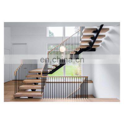 Fancy staircase solid wooden steps with vertical rod railing