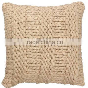 Tan knitted cushion