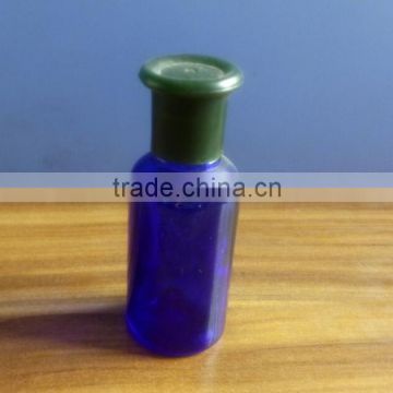 Blue glass bottle with green cap Guangzhou Factory