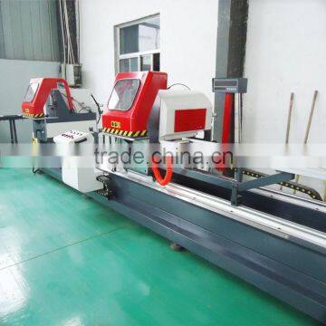 Aluminum mitre cutting saw machine with twin heads