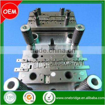 Progressive die for sheet metal forming parts