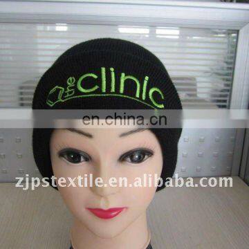 Newest hot sell 100% acrylic turned-over edge black winter beanie with green embroidered logo