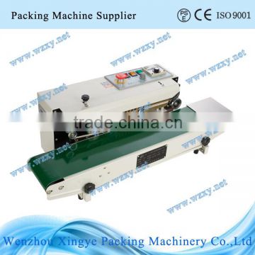 Automatic horizontal continuous band sealing machine for aluminum foil sealing