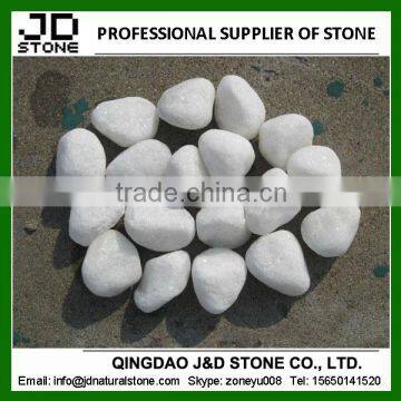 white marble eggs garden ornament paving