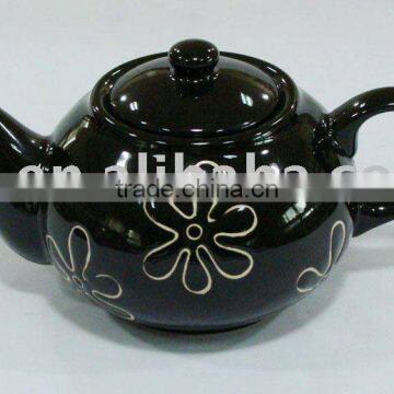 Ceramic teapot with handpainted flower