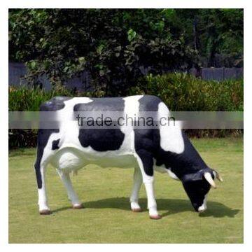 resin life size grazing cow