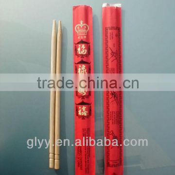 Natural bamboo chopsticks wrapped with open paper bag