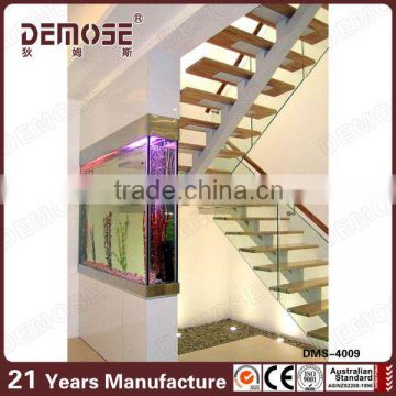 Single stringer interior wood stairs with glass railings