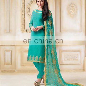 sea green colored banarasi chanderi jacquard suit.