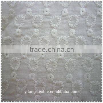 embroidereing cotton fabric with small flowers