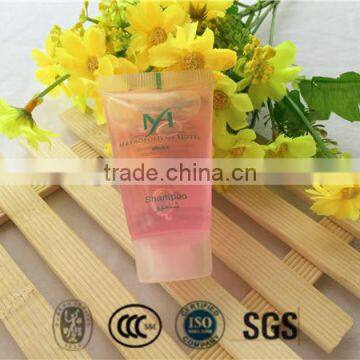 Disposable eco material 30ml transparent tube with pink shampoo liquid