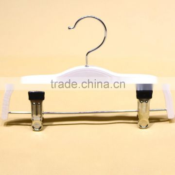 White wooden pants hanger for children garment