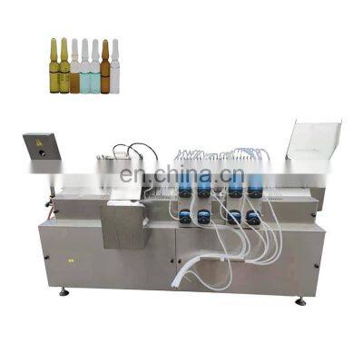 Filling and closing machine for ampoules and vials