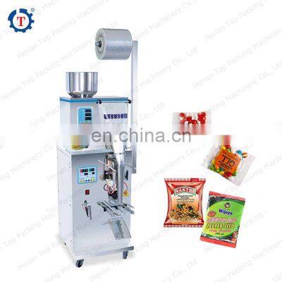 Multi-functional central seal corn sugar nuts electric weiging granular and powder packaging machine