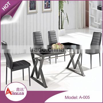 Foshan modern metal base 9mm thick rectangle black lacquer tempered glass dining table for 4 person