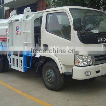 Dongfeng 3 Tons Compactor Lift Garbage Truck for Sales photo-3