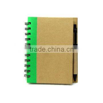 Spiral binding brown paper notebook with pen