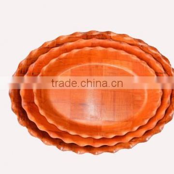 bamboo and wooden fruit plate with water ripples