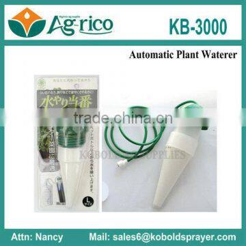 automatic plant watering system with dark green cap