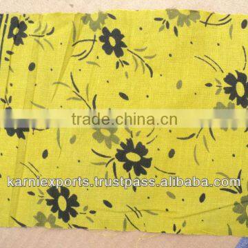 yellow colour floral COTTON FABRICS ,KAUTEN FABRICA PRINT ,JAPANIES ,AFRICAN PRINTS COTTON CAMBRICS FABRICS JAIPUR GARMENTSKARNI