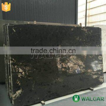 Black background with gold granite slabs for sale