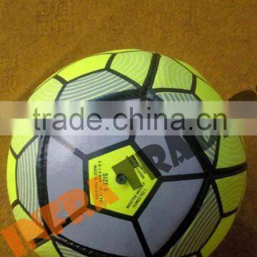 Yellow and black linning soccer football