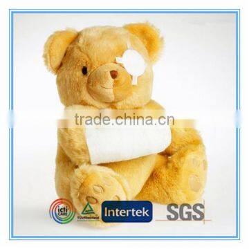 Plush teddy bear with bandage