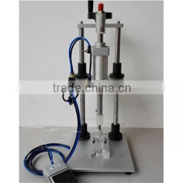 pneumatic perfume collar cap pressing machine/perfume collar closing machine