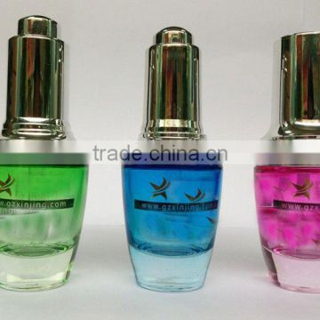 beautiful colored essential oil glass bottle