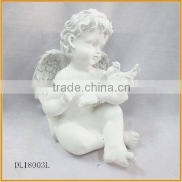 resin sitting garden angel with bird for sale