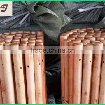 painted wooden handles with hole on top end