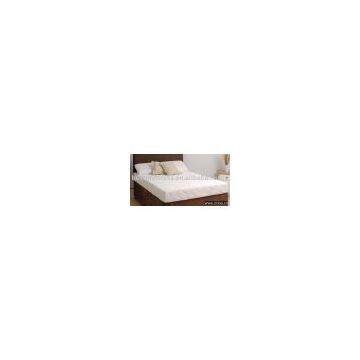 Memory foam mattress with quilted outer cover