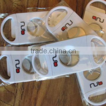 white plastic cigar cutter