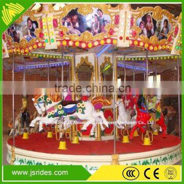 Kids ride mechanical horses carousel for playground