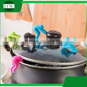 Multipurpose Eco Silicone Person Phone Tableware Raise up Anti Overflow Pot Lid Holder photo-2
