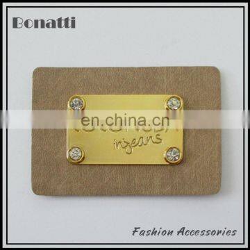 custom high quality jeans rhinestone leather metal labels or patches for garment