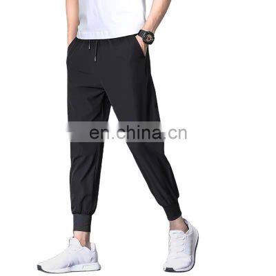 men's fashion casual loose sweatpants tied feet trousers boys elastic waist quick-drying sweatpants M-5XL...